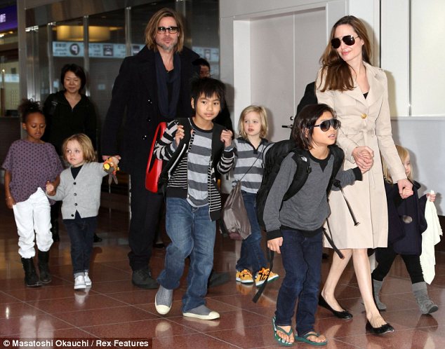 Brad Pitt and Angelina Jolie with their kids FBI considers Brad Pitt investigation